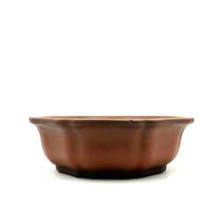 Poterie ronde diametre 24cm haut 8cm