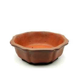 Poterie ronde diametre 24cm haut 8cm