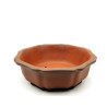 Poterie ronde diametre 24cm haut 8cm